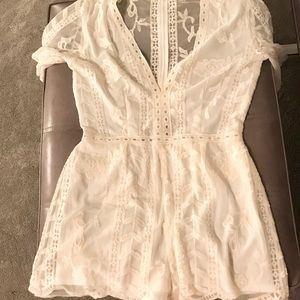 Socialite Plunging Lace Romper, size Medium